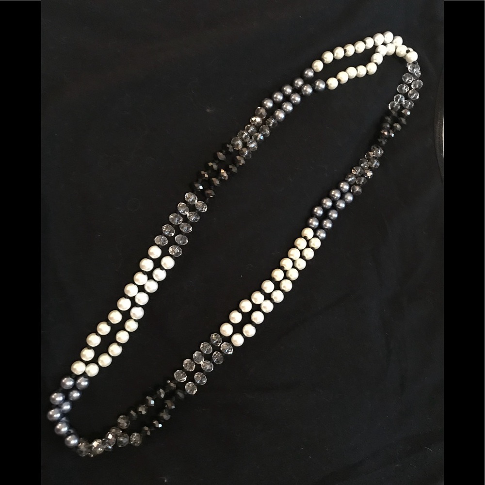 Versatile faux pearl and glass bead necklace.